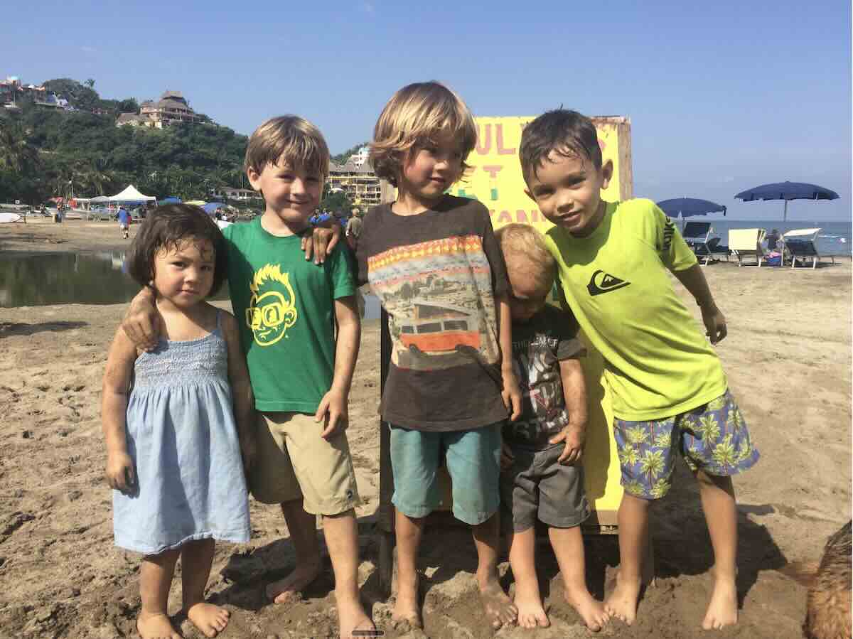Kids surfing in Sayulita — family vacation rentals