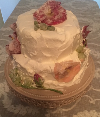 cake covered in candied flowers