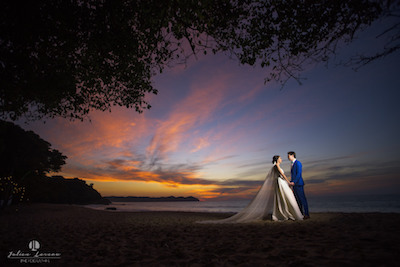 a wedding couple at sunset