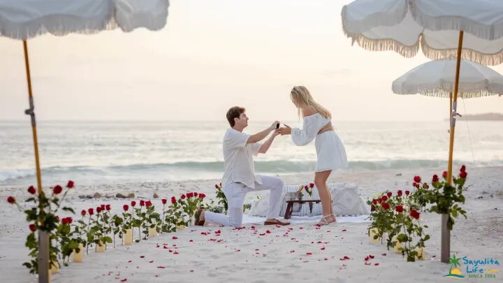 Beach proposal with roses at sunset in Sayulita Mexico